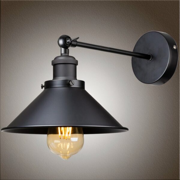 Black industrial wall light with adjustable swivel arm on grey background