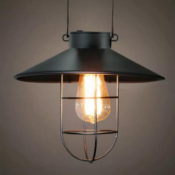 Black solar-powered hanging lamp in vintage lantern style, presented lit