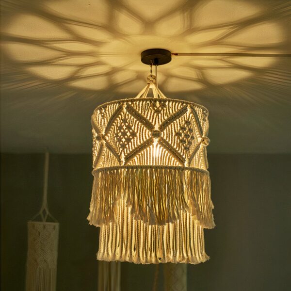 Bohemian macramé pendant in a dark room with subdued lighting