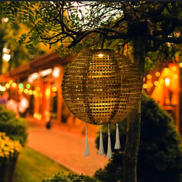 Bohemian-style solar LED suspension lamp, shown lit