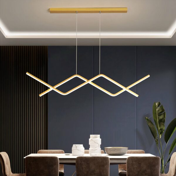 Designer LED kitchen pendant with gold-coloured support in a dining room