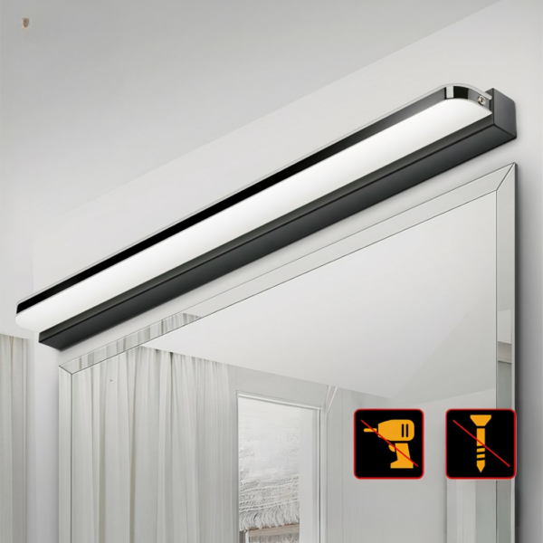 Black long unperforated bathroom wall fixture shown installed above a mirror