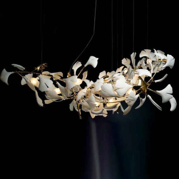 Slim, elegant white leaf suspension presented on a black background
