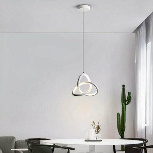Artistic modern pendant lamp installed in a living room