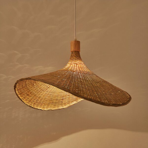 Modern bamboo straw hanging lamp on a dark beige background