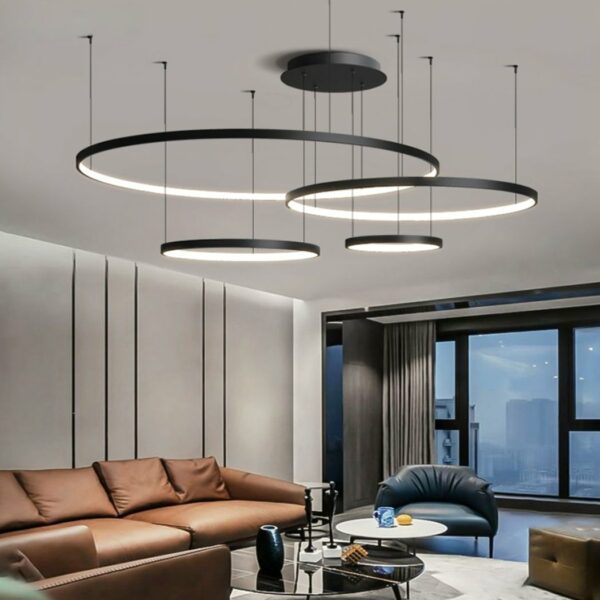 Multiple black metal ring suspension in a living room