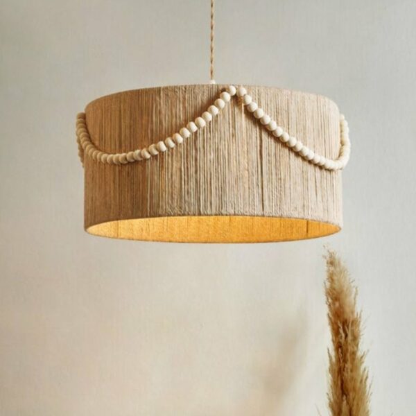 we see a retro bohemian chandelier in hand-woven rattan and wooden beads