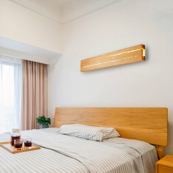 Rotating LED wall light in solid wood