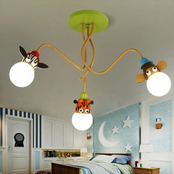 Chandelier with three metal animal heads in a room on a blue background