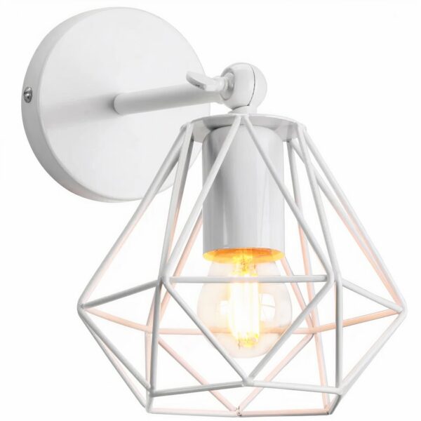 White iron wall sconce, featuring a round base with a horizontal arm. Suspended from this is a shade in the shape of an origami-style pledge. With lit bulb. White background.