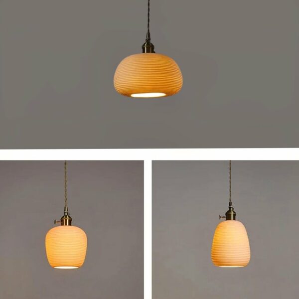 Traditional hand-crafted ceramic hanging lamp in three versions, suspended from the ceiling, lit and with a gray background.