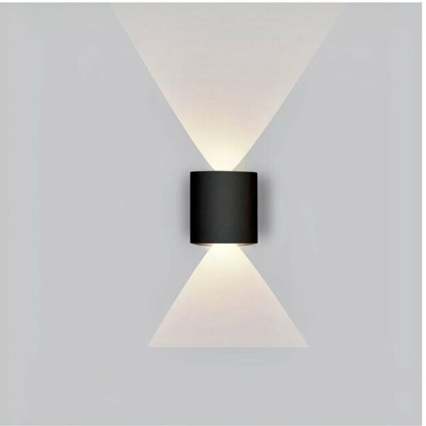 in a living room with light-colored walls, two classic black led wall sconces are shown