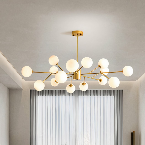 Gold suspended chandelier with opal glass spheres Modern fifteen-head gilded iron chandelier with curtains on a grey background