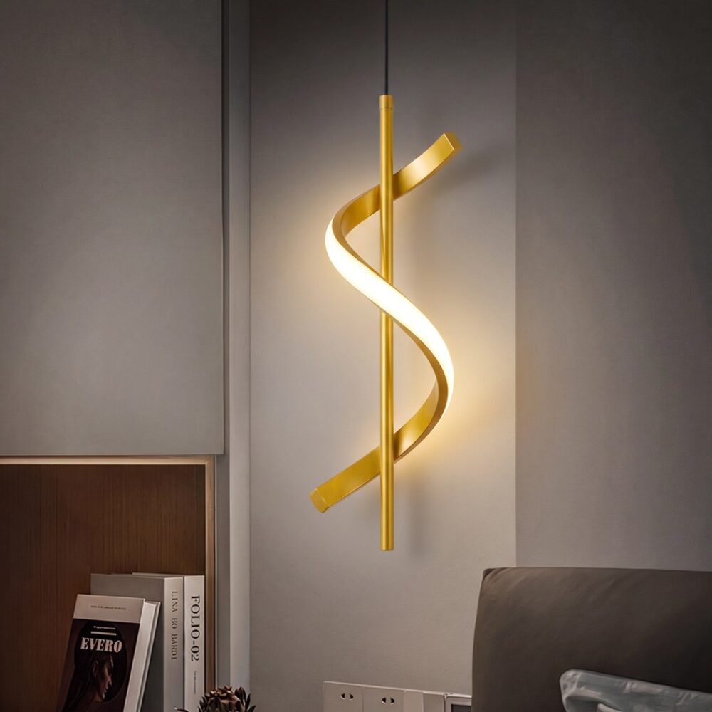 Gold LED spiral pendant light switched on in a grey bedroom