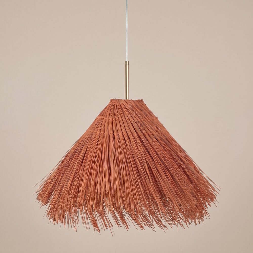 Terracotta hut-shaped straw chandelier hanging from a transparent cable with a short gold tube