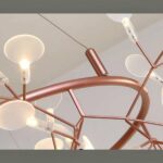 Close-up of the copper branch chandelier frame joint and hanging cable