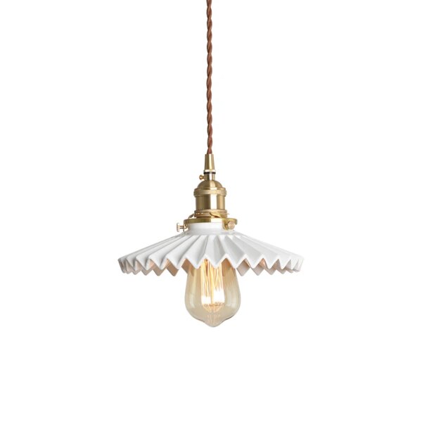 White scalloped ceramic pendant light with a brass fitting and exposed bulb