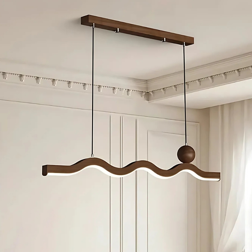 Dark wavy wood pendant light bar in a room with ornate coving and a curtain