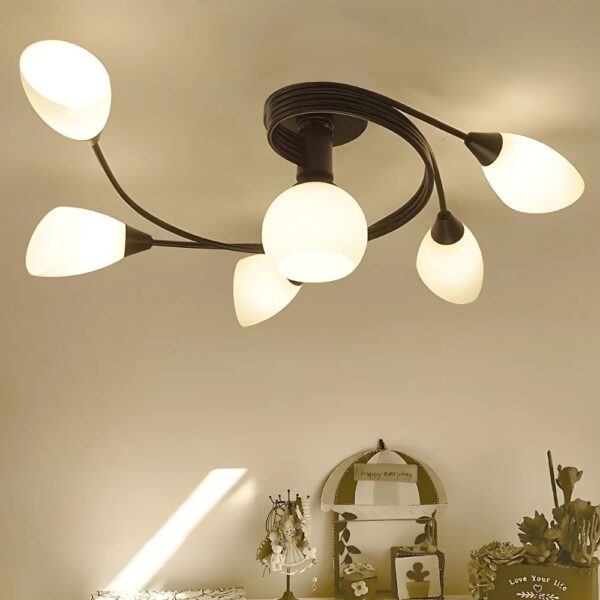 Black branch-shaped ceiling light with white tulip-shaped glass shades