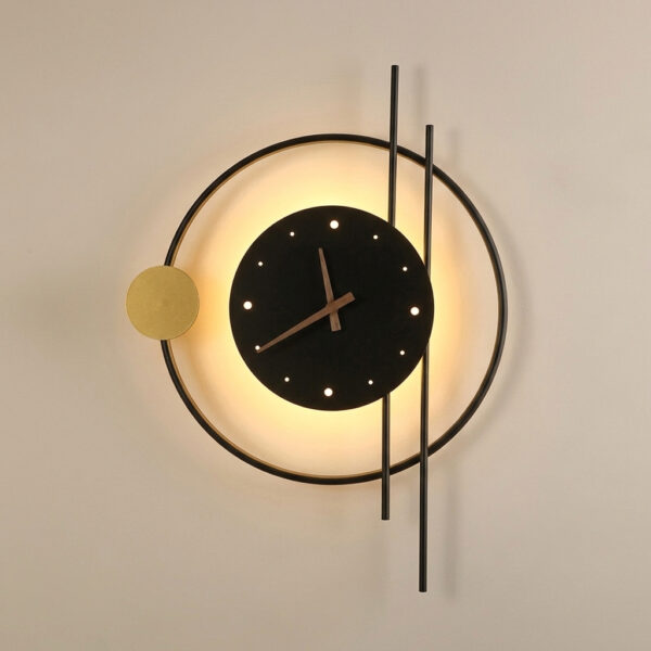 Decorative wall light shaped like a backlit clock with a gold accent disc