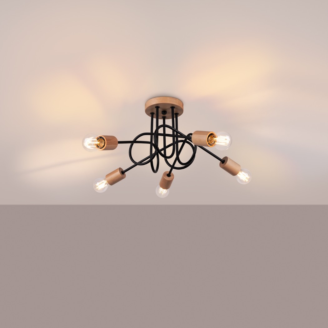 Black wire ceiling light with five wood bulb holders spread in a star shape