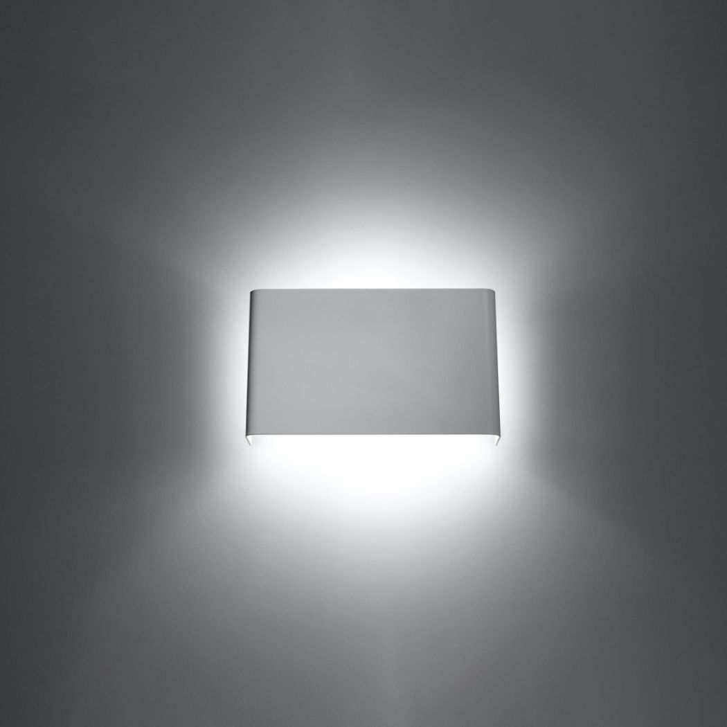 White rectangular wall light spreading a wide beam of light up and down