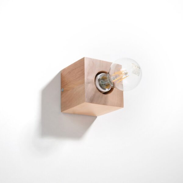Wood cube wall light with an exposed round bulb at its center
