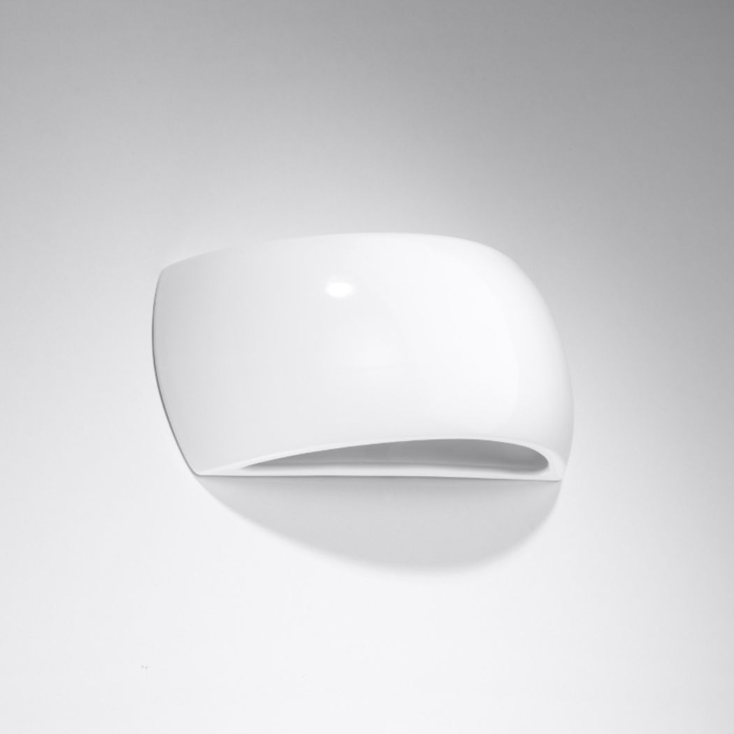 White half-moon ceramic wall light with a glossy curved finish