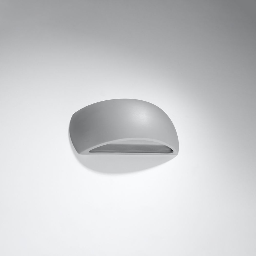 Grey ceramic half-moon wall light with a curved profile