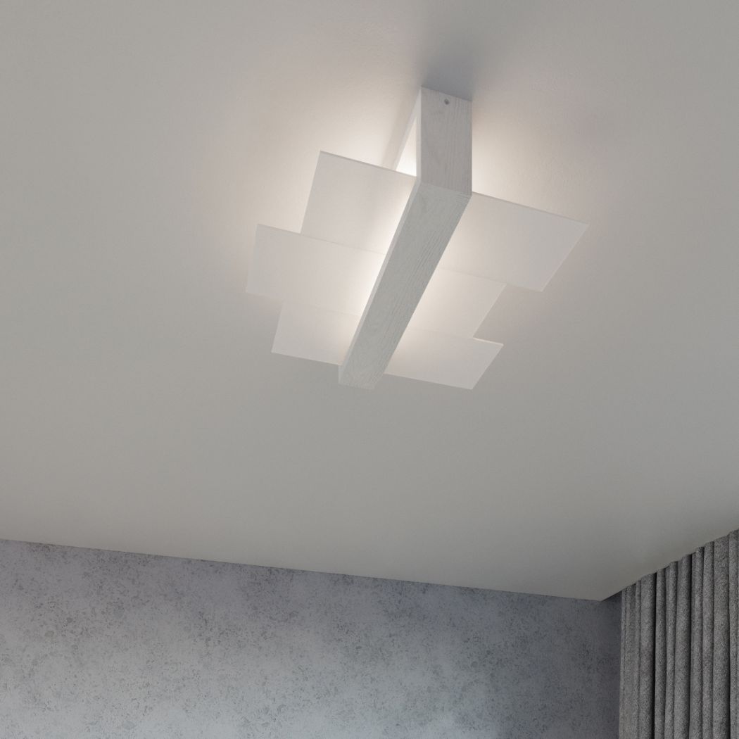 Room with a cross shaped ceiling light in white glass panels beside a curtain