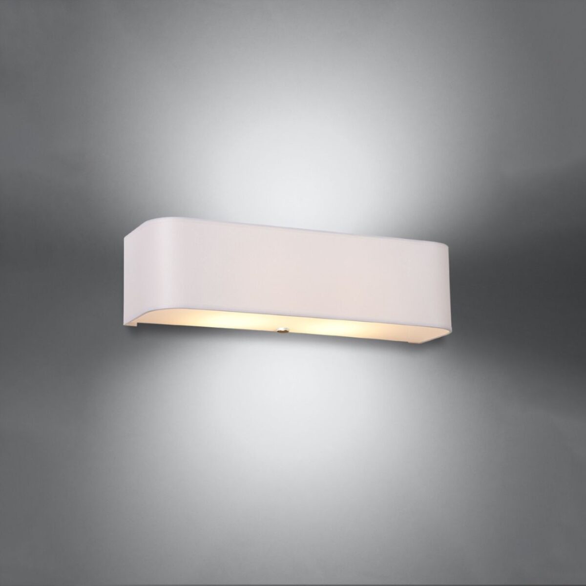 White rectangular wall light with rounded ends glowing softly beneath