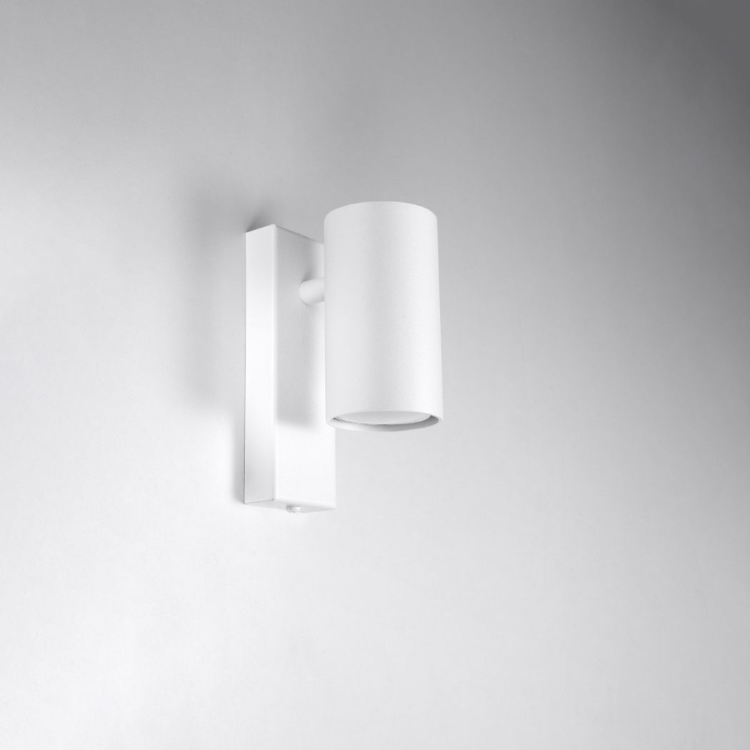 White rectangular wall bracket holding an angled white cylindrical shade, unlit