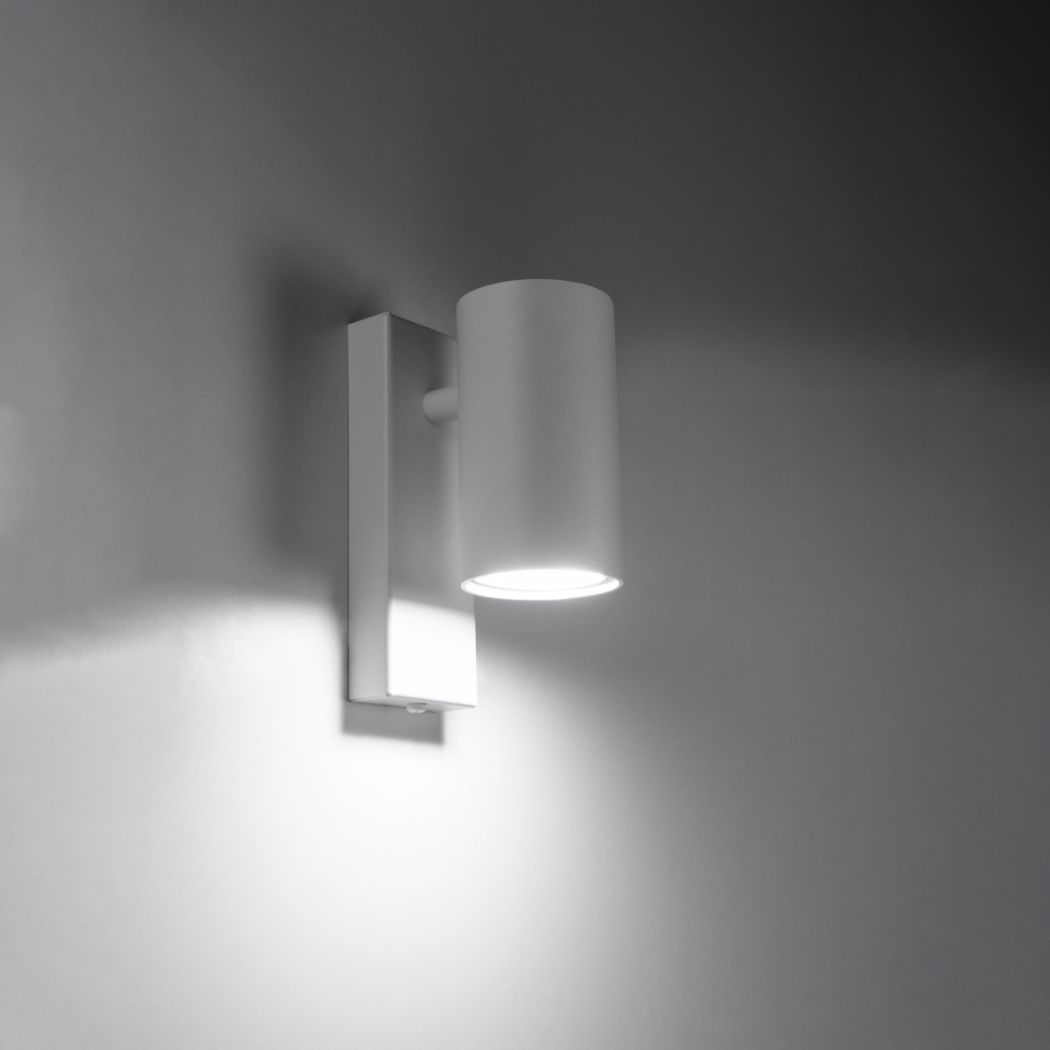 White rectangular wall bracket with a cylindrical shade casting light downward