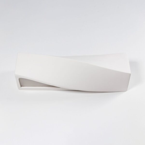 Wavy angular white ceramic block wall light with a sculptural twist
