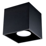 Close-up of the black cube-shaped surface-mounted spotlight