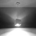 Grey cube pendant on a bent ceiling bracket glowing brightly against a plain background