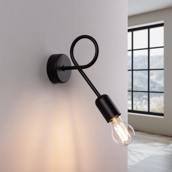 Black looped wall light with a curved arm and exposed bulb