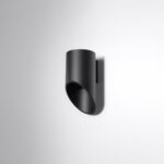 Black cylindrical wall light with an angled diagonal cut opening
