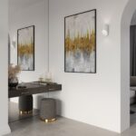 Small round white wall light above a dressing table with candles and a mirror