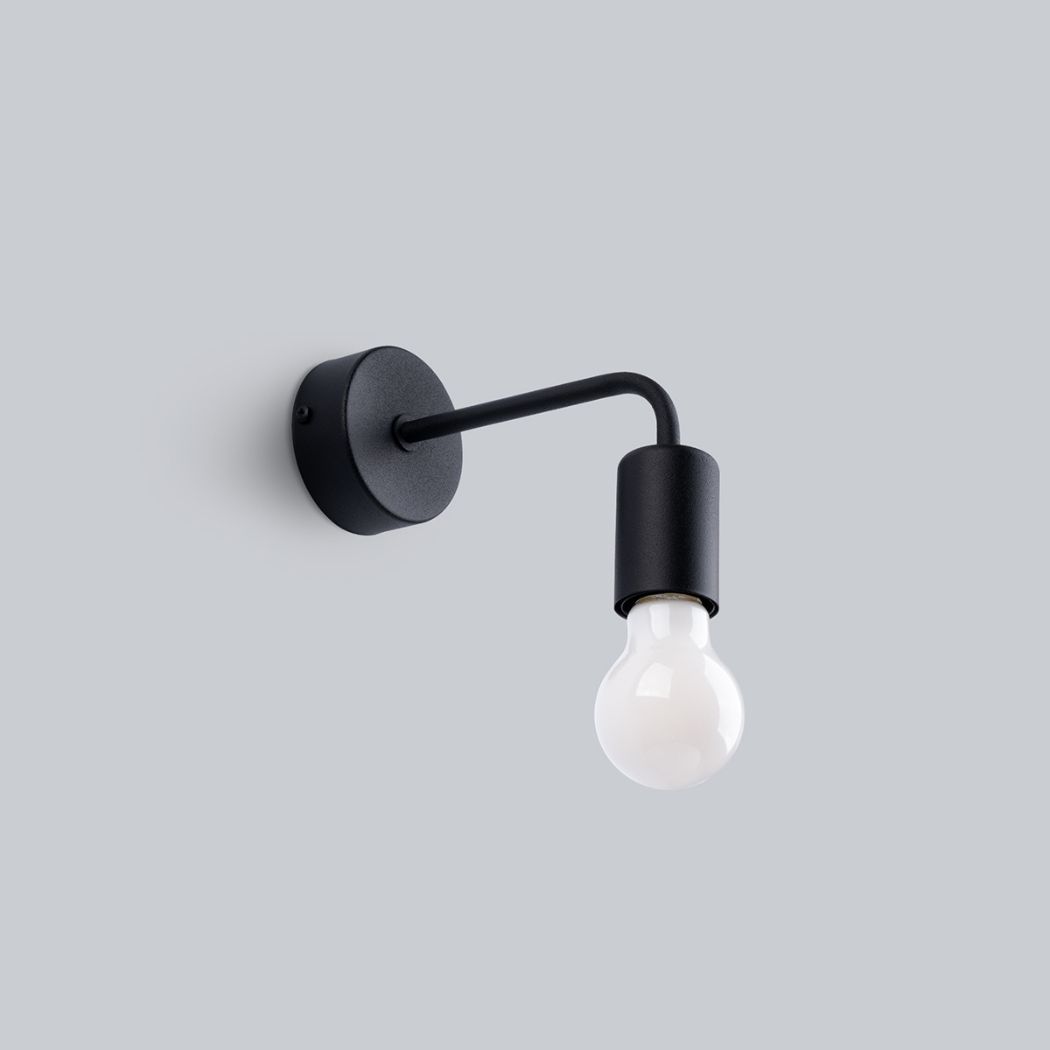Minimalist black wall light with an exposed hanging bulb