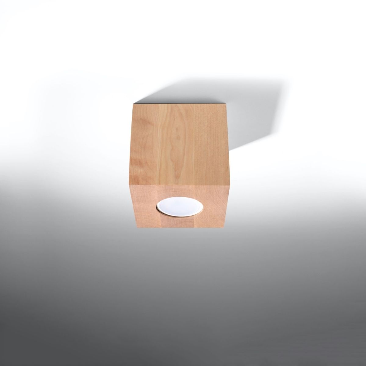 Minimalist cube ceiling light in natural wood with a round lens