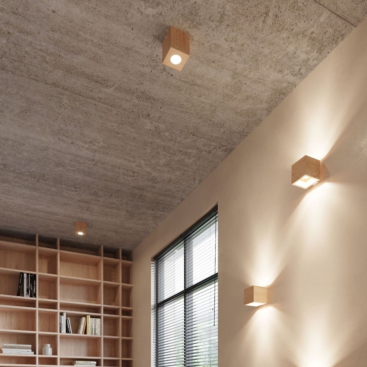 Recessed ceiling spotlights and glowing wall cubes beside a tall window