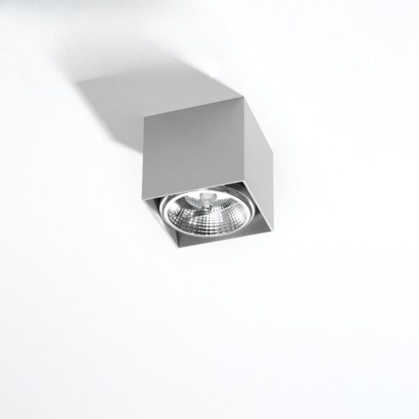 Grey square ceiling spotlight with an angled adjustable lens