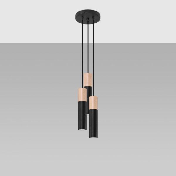 Three black and wood cylindrical pendant lights at staggered heights