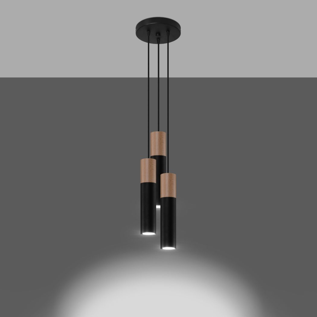 Three black and wood cylinder pendant lights glowing on gray background