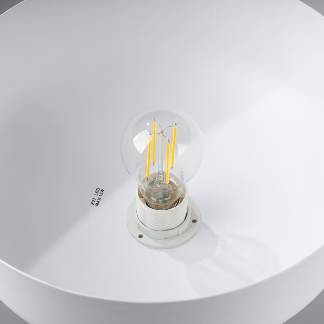 Top-down view into the white pendant shade showing the bulb holder inside