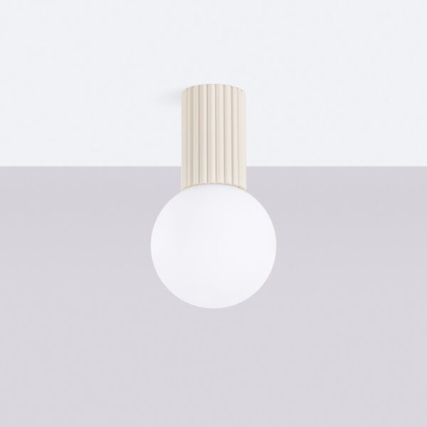 Ribbed cream cylindrical ceiling light topped with a round opal globe