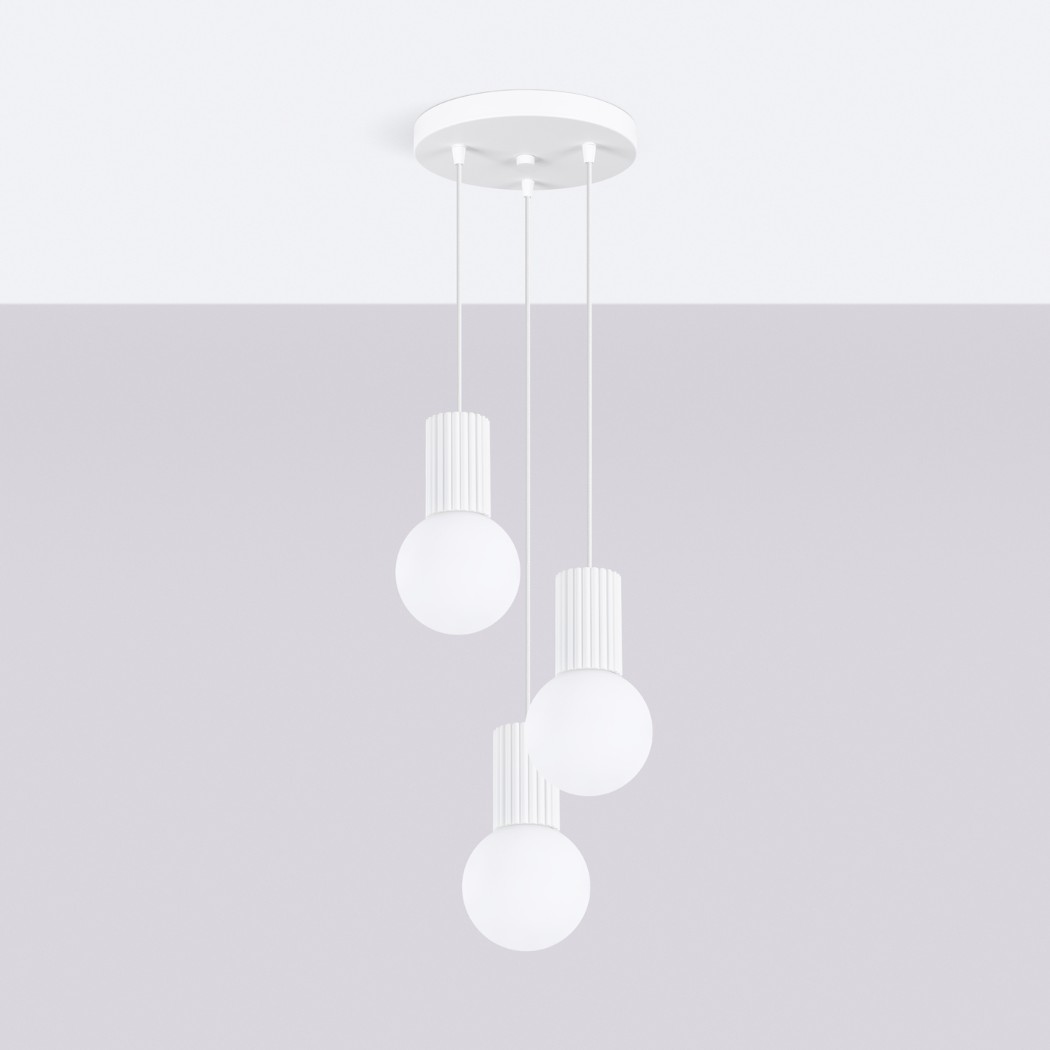 Three white globe pendants each topped with a fluted cap, at staggered heights