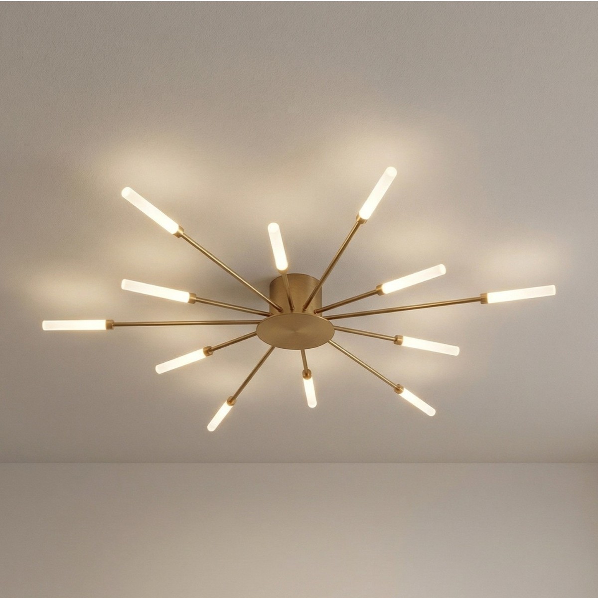 Gold sputnik style ceiling light with radiating frosted tube rods