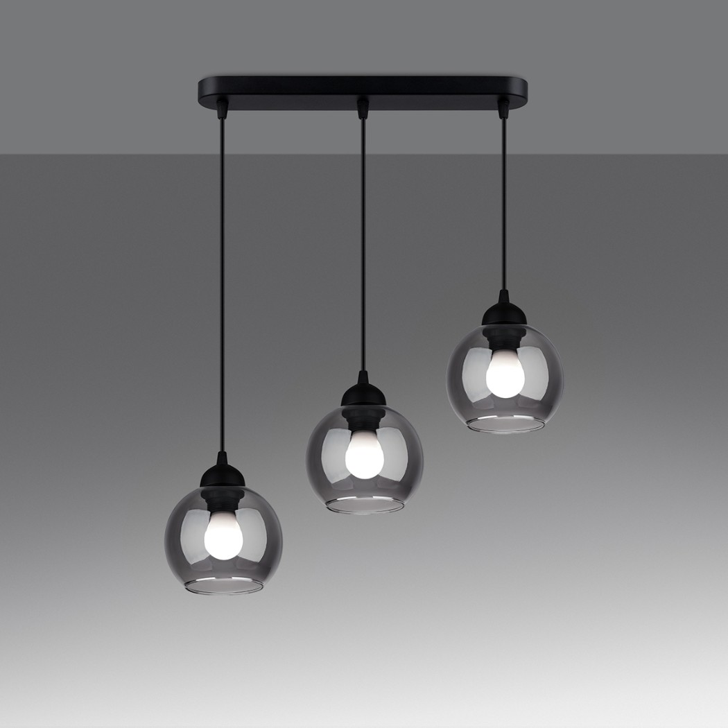 Pendant lamp with three smoked glass globes hanging from a black bar